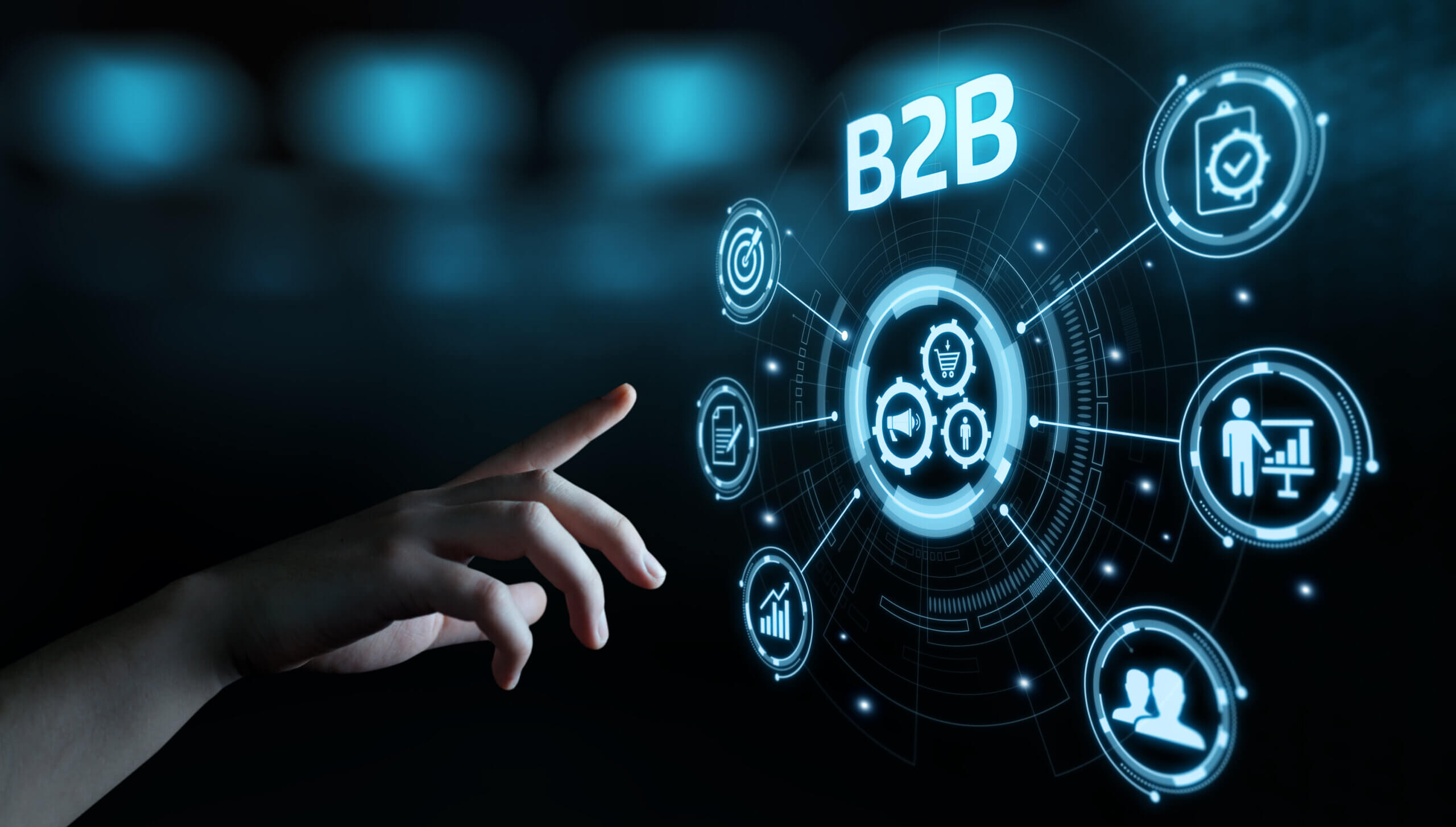 Hand interacting with futuristic B2B interface.