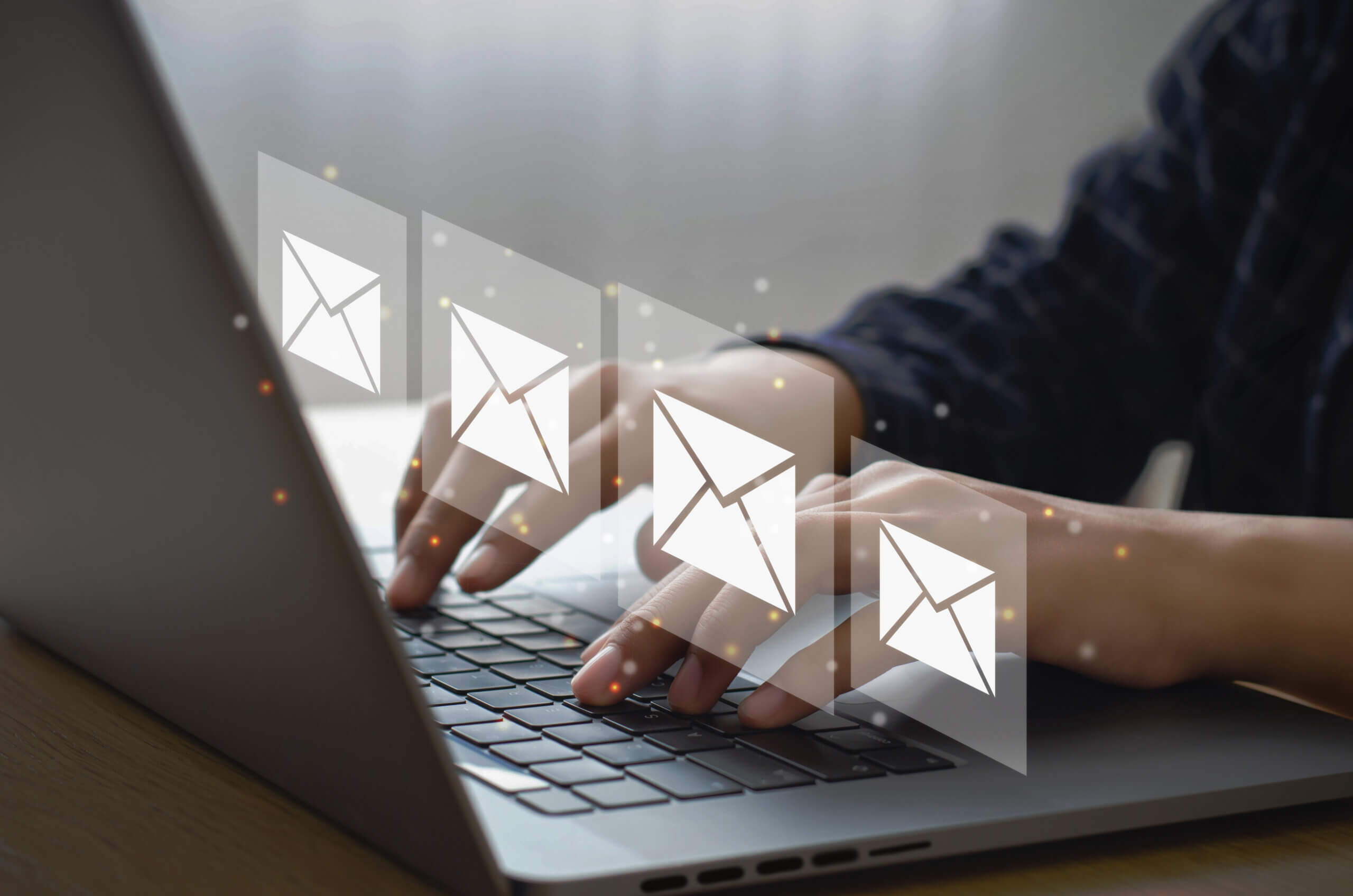 Businessman in email marketing concept The company's online presence informs its customers by email and digital newsletters via Internet messages.