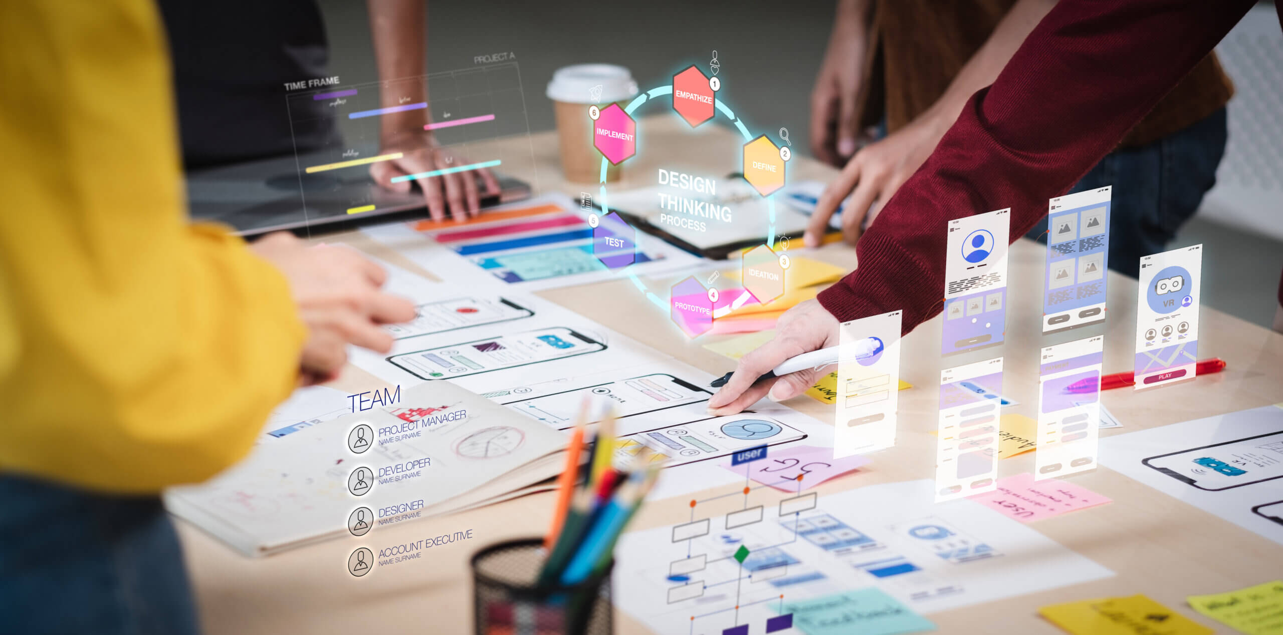 Creative team prototyping futuristic app interface.