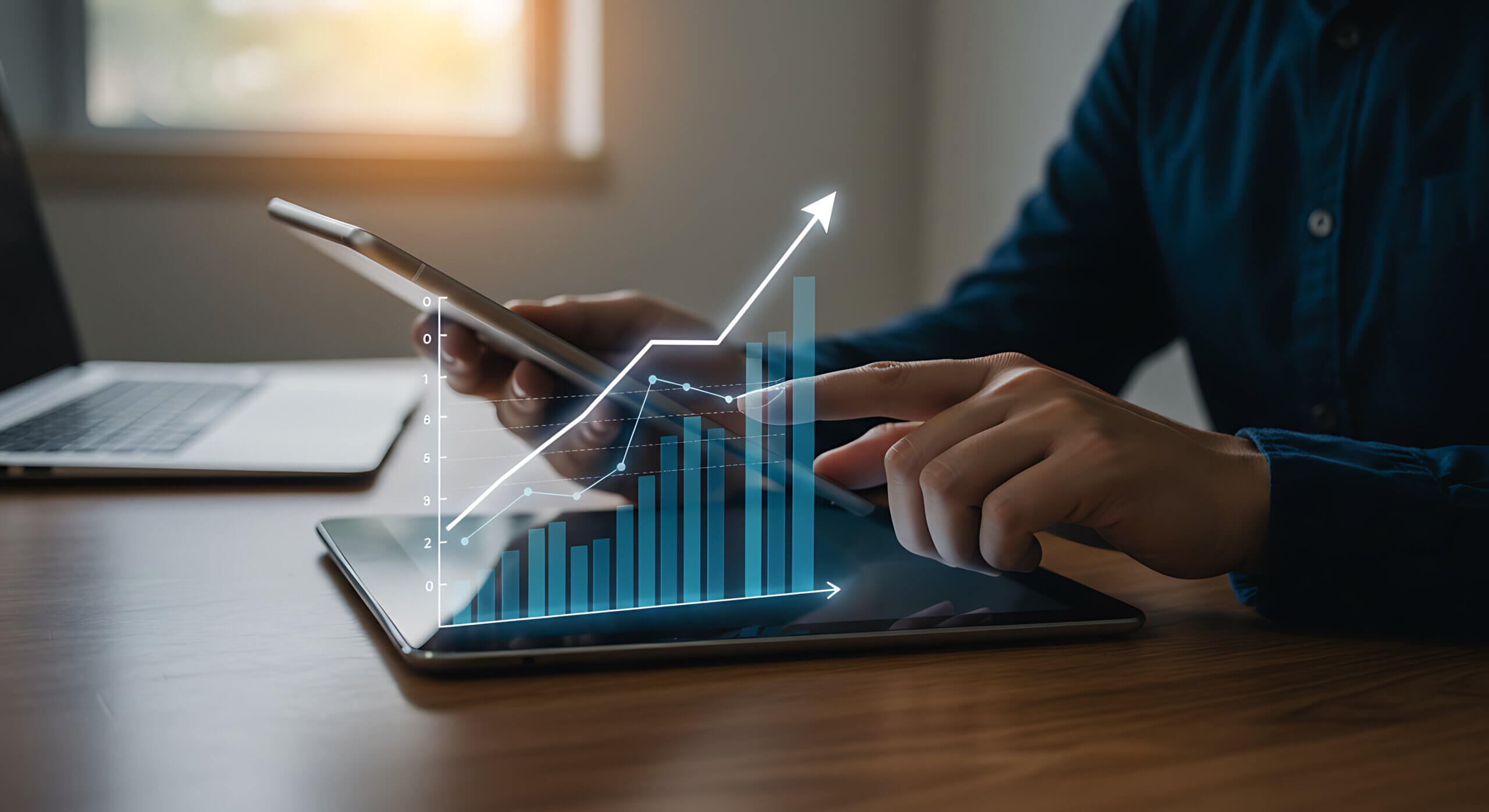 Analyzing Financial Growth Trends with Digital Data Visualization on Tablet Devices Showing Upward Stock Market Performance