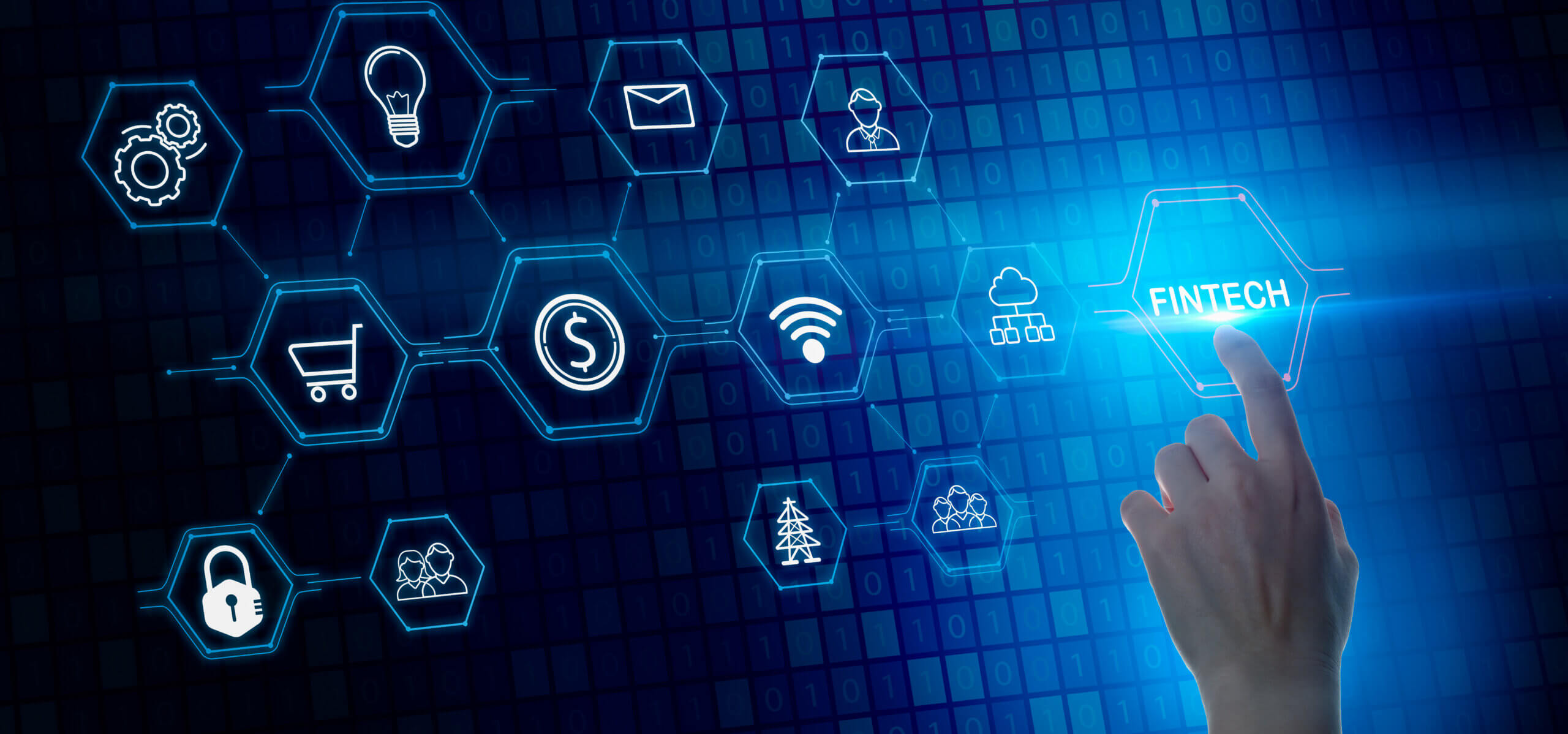 A hand reaches toward a glowing digital interface of connected hexagonal icons representing fintech concepts—such as payments, security, cloud computing, connectivity, and e-commerce—with the word “FINTECH” highlighted on a blue, data-themed background.