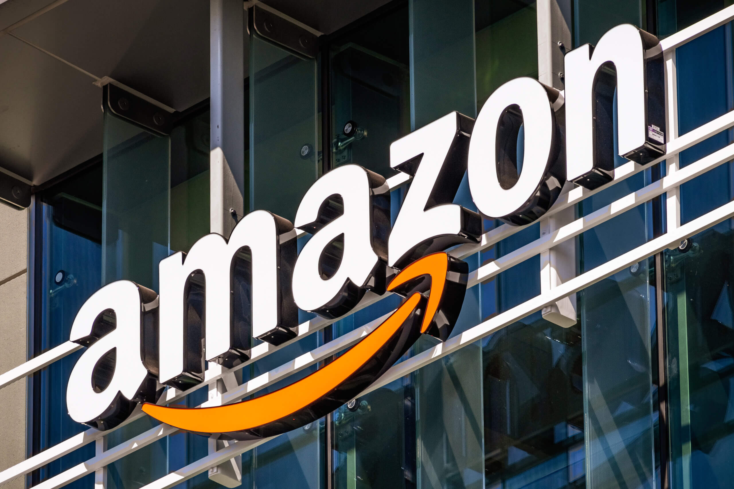 July 26, 2019 Palo Alto / CA / USA - Amazon logo on the facade of one of their office buildings located in Silicon Valley, San Francisco bay area