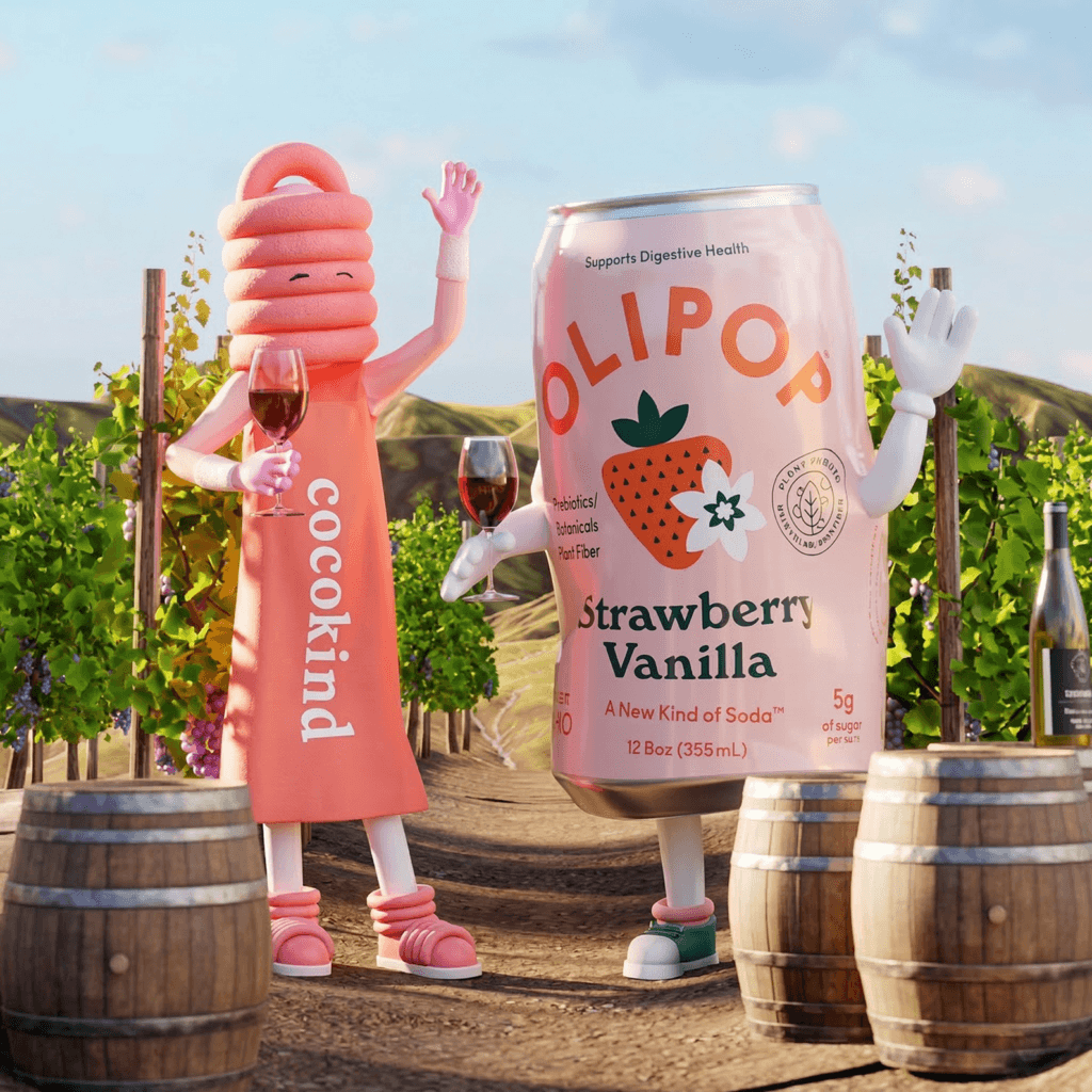 Olipop Strawberry Vanilla can displayed with a brand mascot in an outdoor vineyard setting