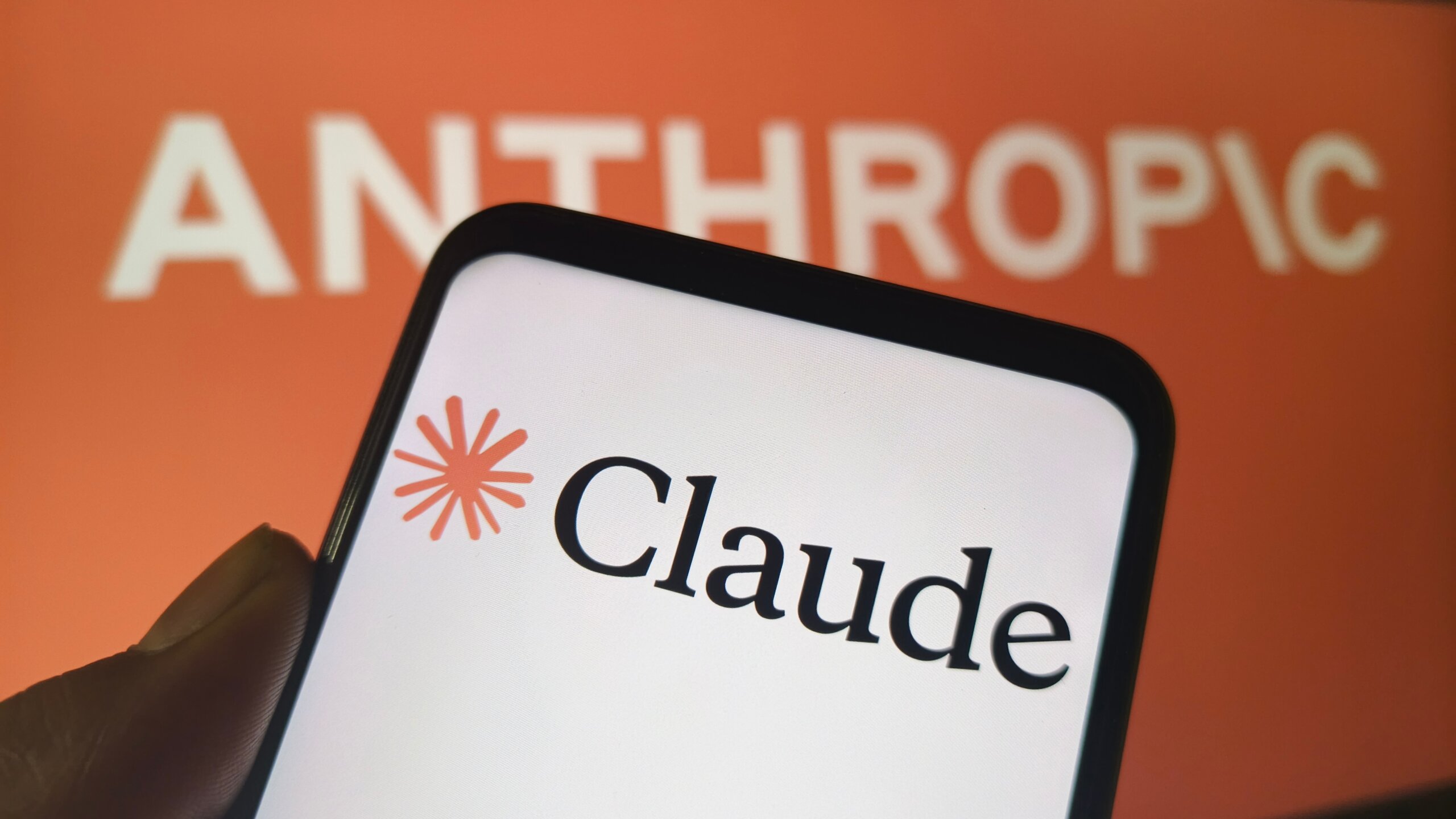 Claude AI app on smartphone screen with Anthropic logo