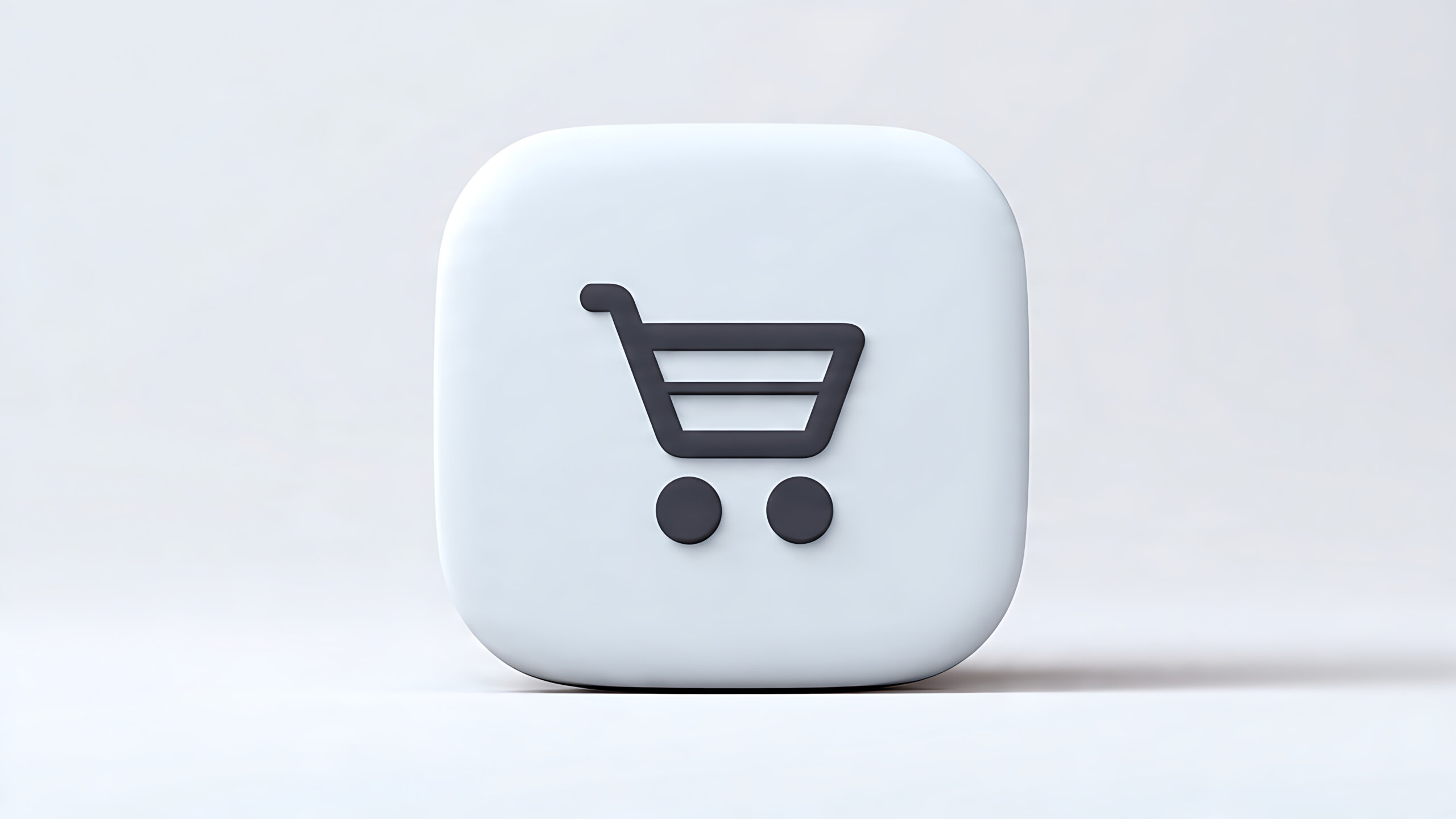 Clean minimalist three-dimensional rendered icon of a shopping cart symbol on a white rounded square, perfect for digital commerce, online shopping, and e-commerce application interfaces