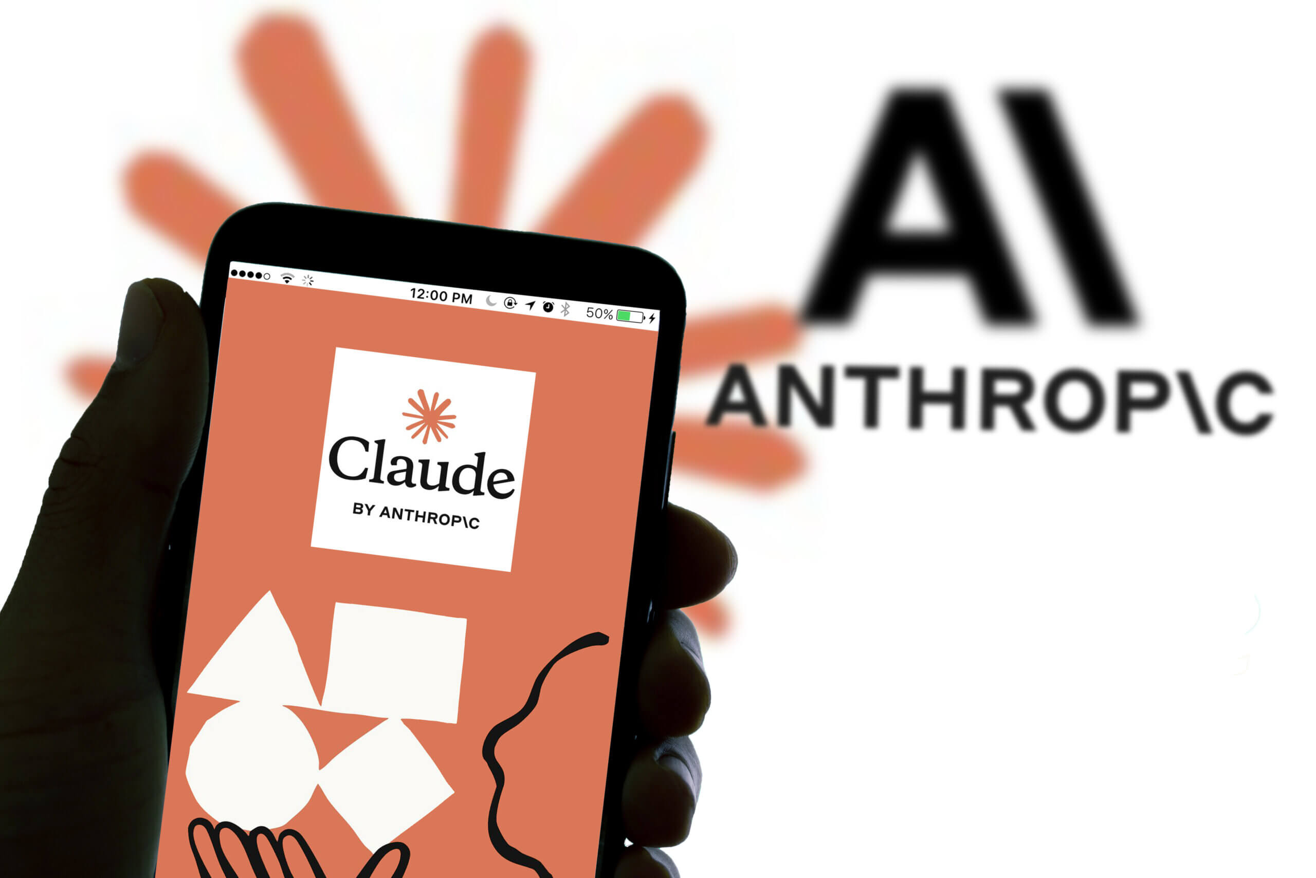 In this photo illustration the logo of the AI chatbot Claude by Anthropic is seen on the display of a smartphone.
