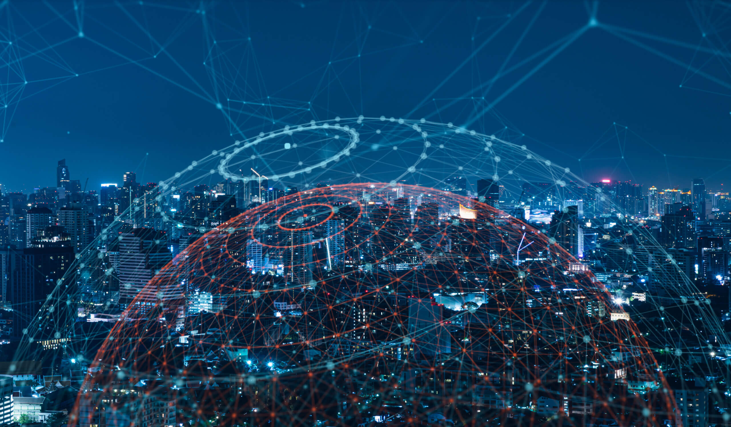 Modern city with wireless network connection and city scape concept.Wireless network and Connection technology concept with city background at night.